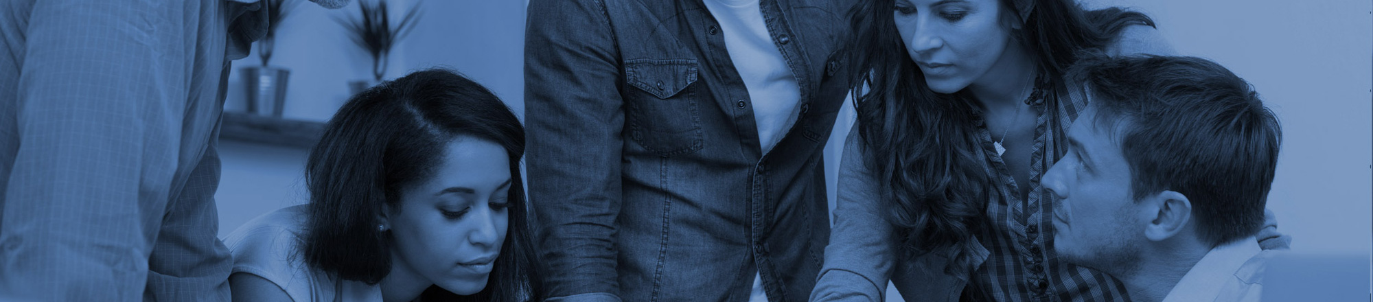 People looking at information in an office